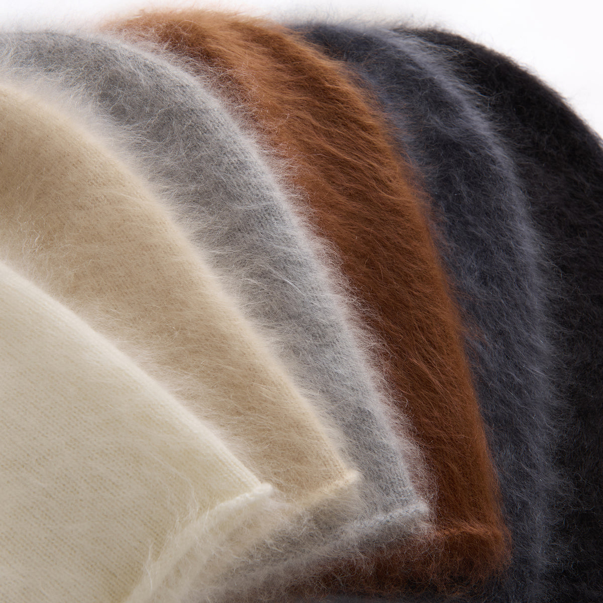 Folded brushed cashmere in soft winter colours